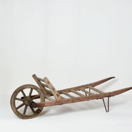 Wooden wheelbarrow, antique furniture, vintage decoration rent