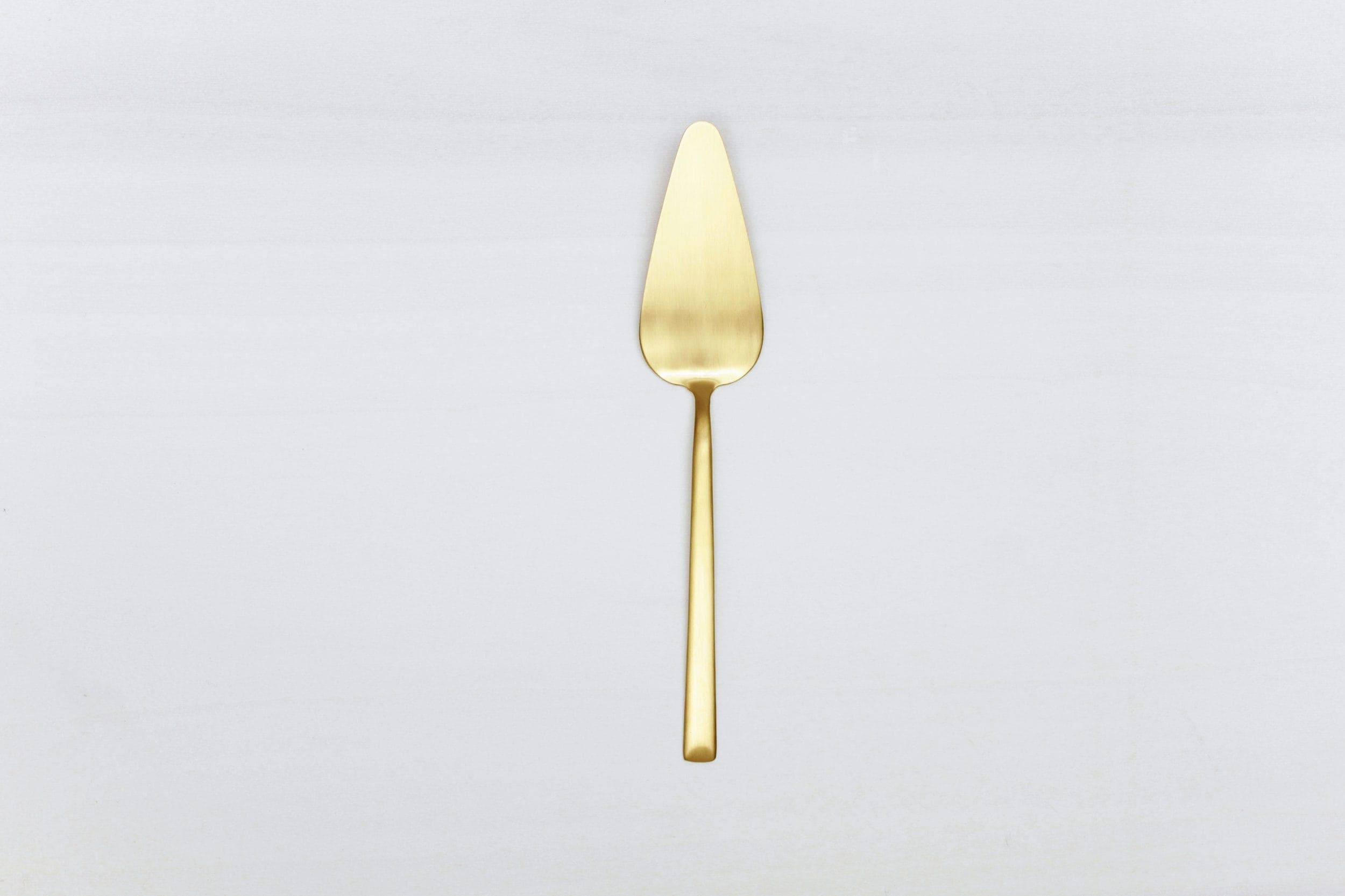 Mietbesteck für Hochzeit. Tortenheber in gold mieten.