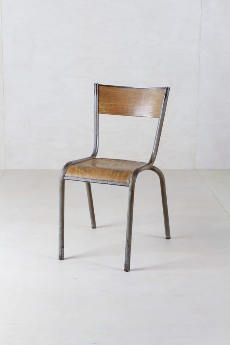  | A classic from French classrooms. Tubular steel chair Mullca 510 has a neat patina and is from the 1960s. In the different colours we rent out about 120 steel chairs. Some of the chairs have small scribbles and indentations with which pupils immortalized themselves many years ago. | 