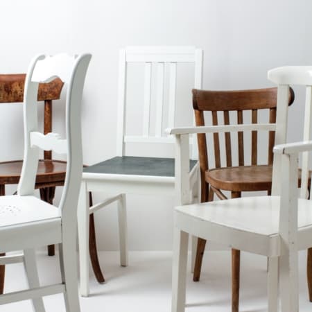 Wooden Dining Chairs Laura White & Brown Mismatching | With these vintage mismatching wooden chairs you can decorate any table. Through the individual shapes and designs, the different shades, in brown and white, results a unique but striking picture at your party, wedding or event. Up to 350 mismatching wooden chairs are available, allowing a long table to be beautifully designed. | gotvintage Rental & Event Design