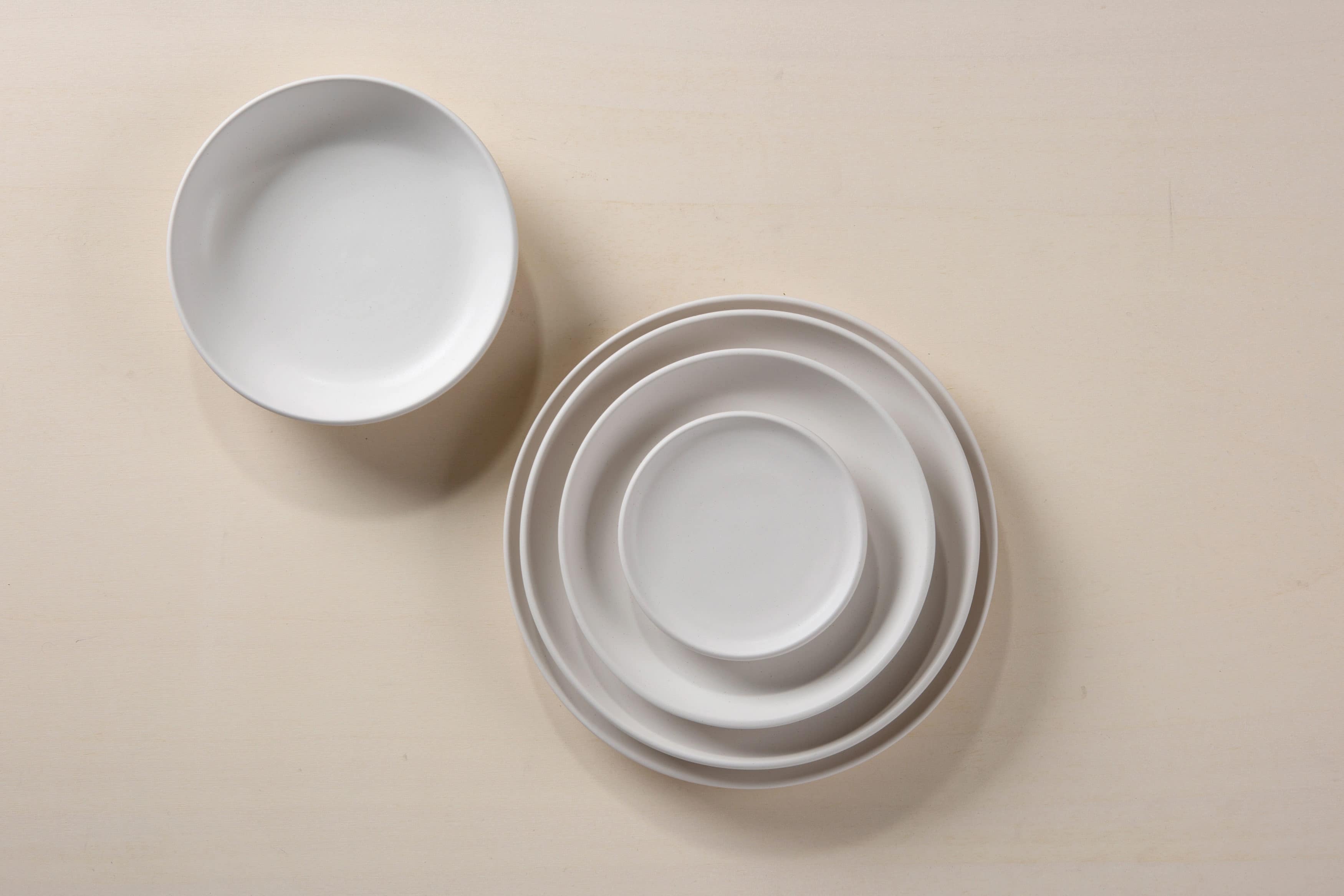  | Experienced Italian pottery manufacturers use their decades of experience and the secrets of ceramic processing to produce these beautiful plates by hand. The organic shapes that form in the creation and the rustic stoneware are beautifully accentuated by the plates' matt white hue.The perfect partners for the pithy ceramic surface: our minimalist "Amparo" linen napkins in great colours and our Antonia mismatched cutlery, in which many different vintage silver cutlery pieces are mixed.The "... | 