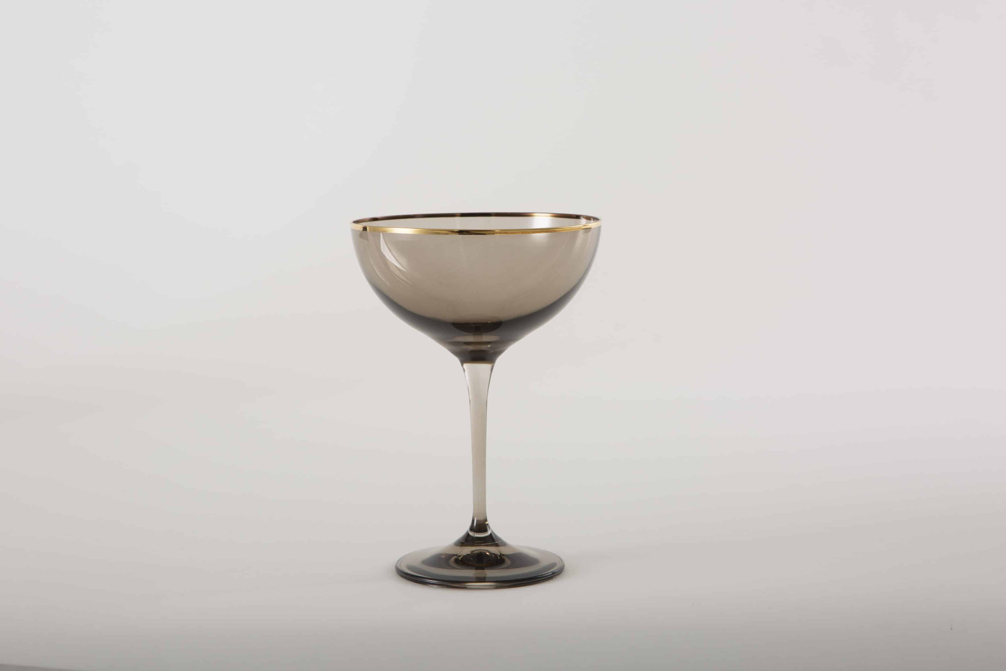 Champagnerschale mit Goldrand im Rauchglas Look mieten