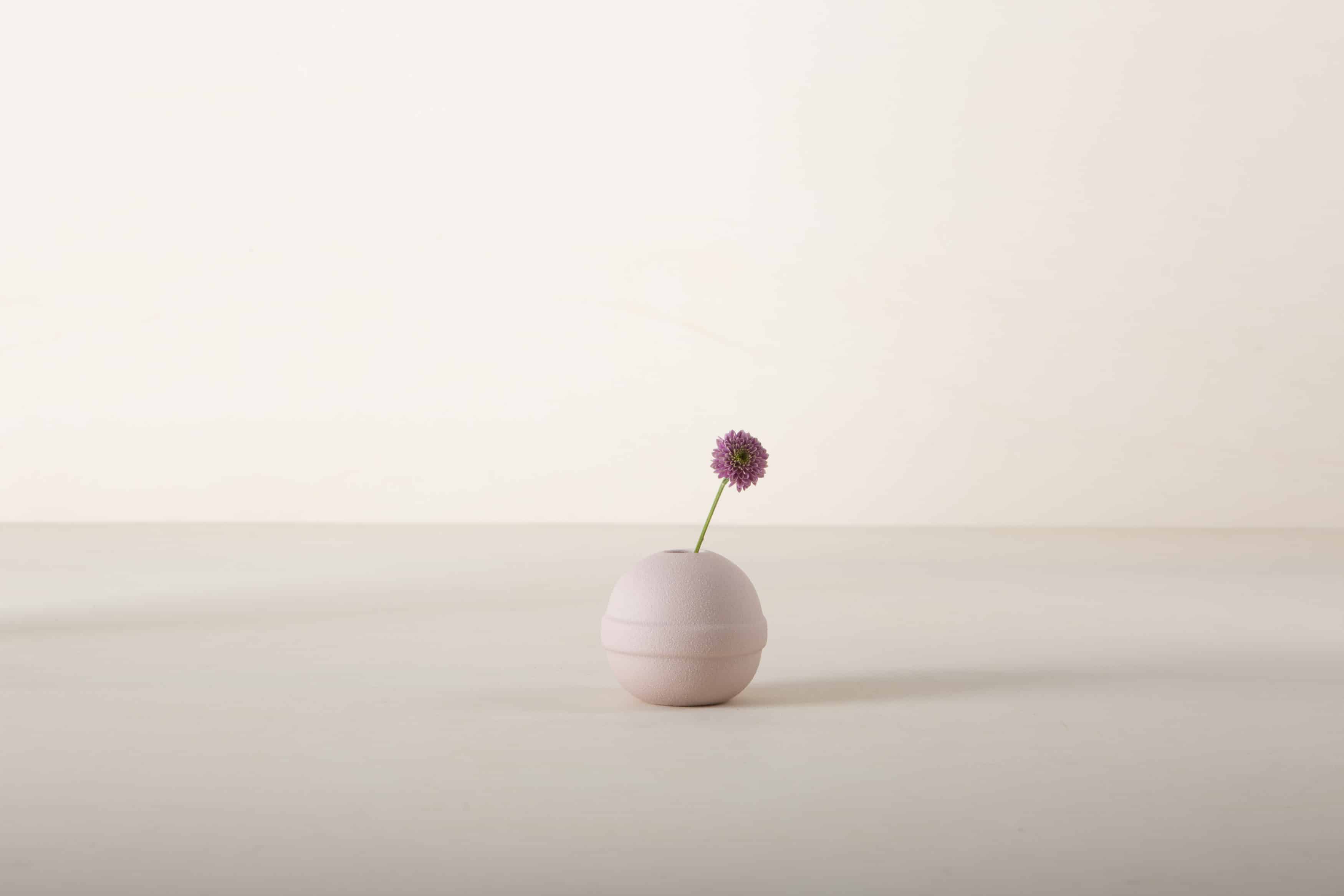  | This pretty vase comes in the most adorable round shape. Since it is relatively small, it is the perfect vase for the dining table, because people can easily look over it and continue a conversation across the table. The vase looks wonderful as a display for single flowers as well as for small bouquets. Use a single one as an eyecatcher or a group for maximum impact. | 